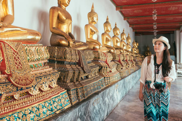 istock Asian woman visited an ancient temple 1023338588
