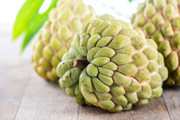 istock fresh sugar apple fruit(Custard Apple),sweetsop on wooden table background 1023343886