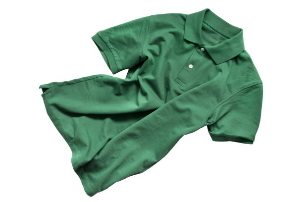 istock Green shirt isolated 1023343904