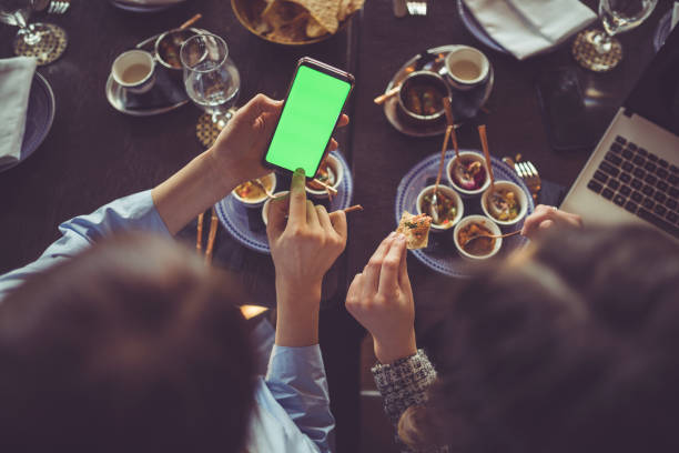 istock Lunch break with smart phone 1023347280