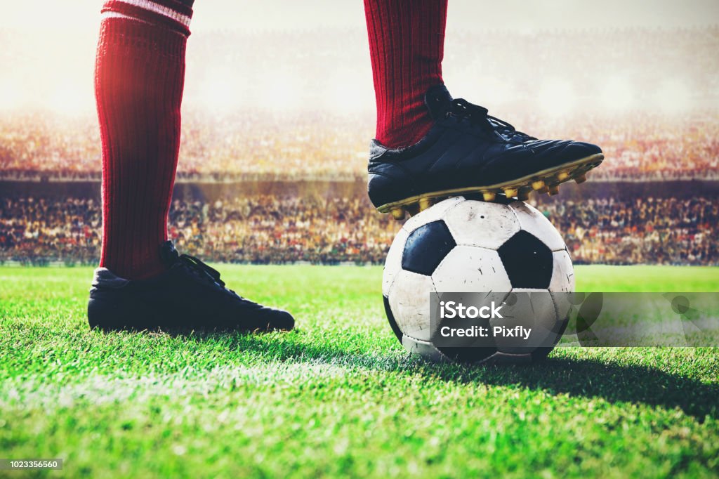 soccer football player tread on the ball at kick off line Soccer Stock Photo