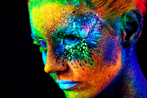 Close up UV portrait bodyart with colors