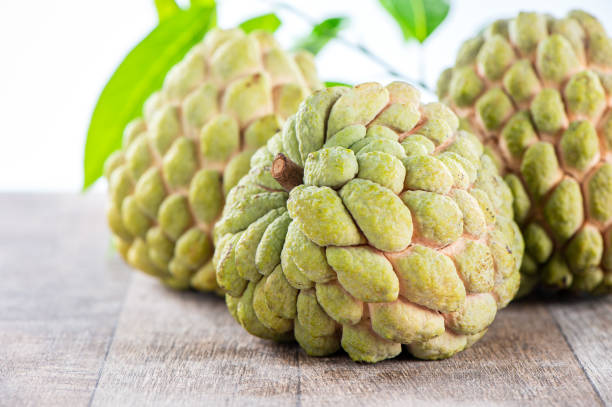 istock fresh sugar apple fruit(Custard Apple),sweetsop on wooden table background 1023367400