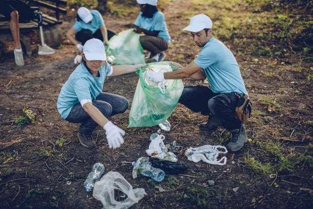 istock People cleaning nature 1023367860