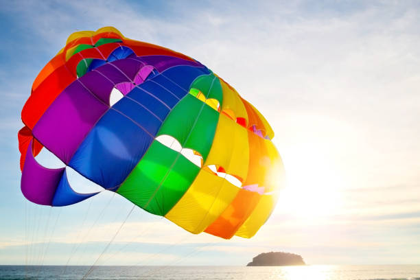istock Color parachute on the beach. 1023368732