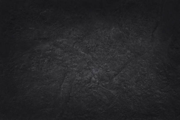 istock Dark grey black slate texture in natural pattern with high resolution for background and design art work. Black stone wall. 1023371800