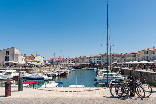 Isle of Re, France - August 6 2018 : the old port of Saint-Martin is the most picturesque of the Isle of Re, located right in front of La Rochelle on the west coast of France, and very popular in summer.