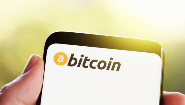 istock Bitcoin name and logo on otherwise blank phone screen 1023376368
