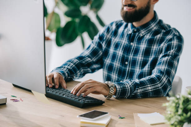 istock cropped shot of successful seo using computer at workplace 1023378730