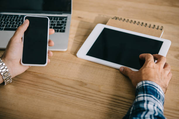 istock cropped shot of seo professional using different gadgets at workplace 1023378758