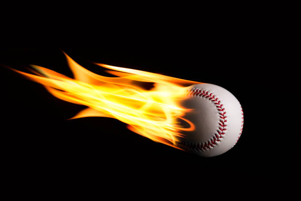 istock Baseball Ball In Flames Over Black Background 1023379136