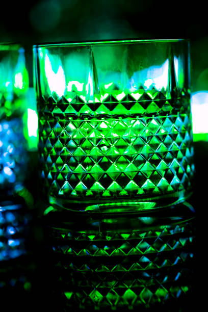 istock bar colored lights with glasses of alcohol 1023384638