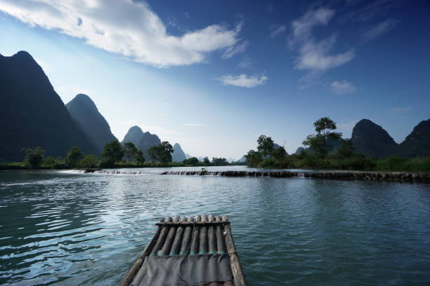 Bamboo raft on the Yulong River in China stock photo