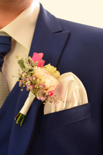 istock Corsage on a wedding Suit. 1023393998