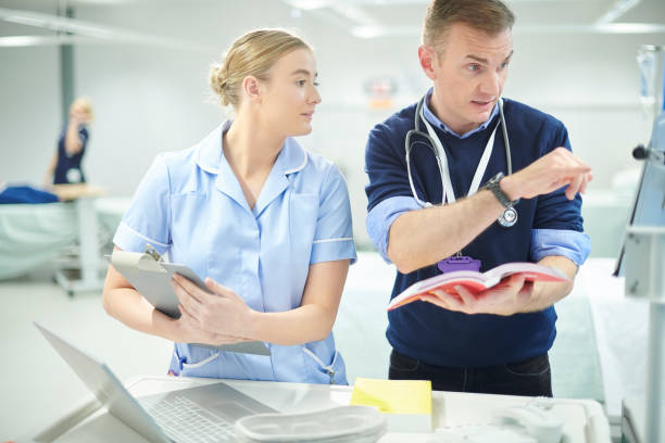 istock doctor checking medicine dosages 1023394644