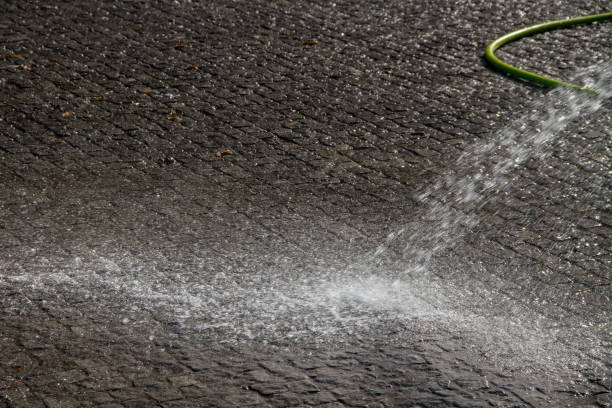 istock Wet cleaning of street. 1023402148