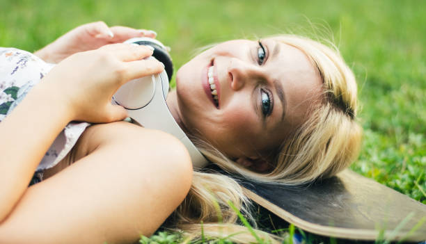 istock Dreamy woman in the grass 1023412768