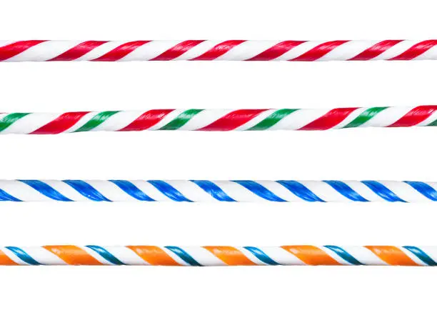 Candy cane. Set of different striped twisted handmade candy canes border sticks.