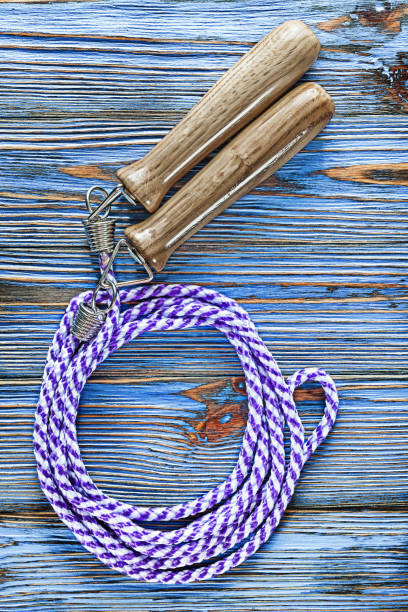 istock Jumping rope on blue vintage wooden board 1023417258