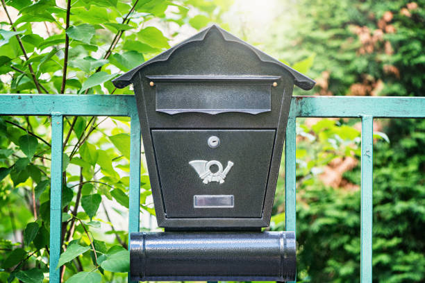istock Mail box on the wooden fence. 1023422100