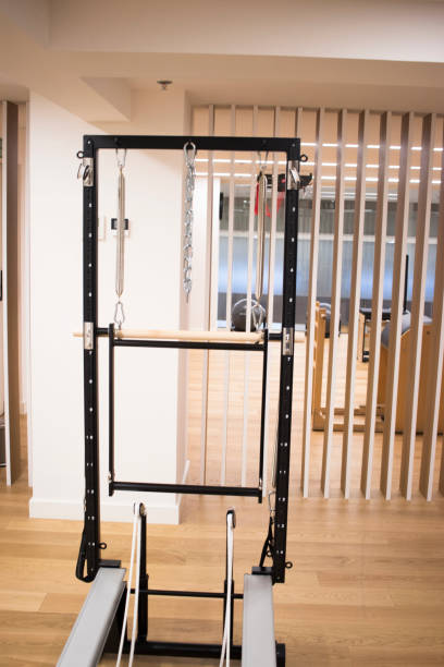 istock Pilates machine fitness studio gym room with training machines 1023423024
