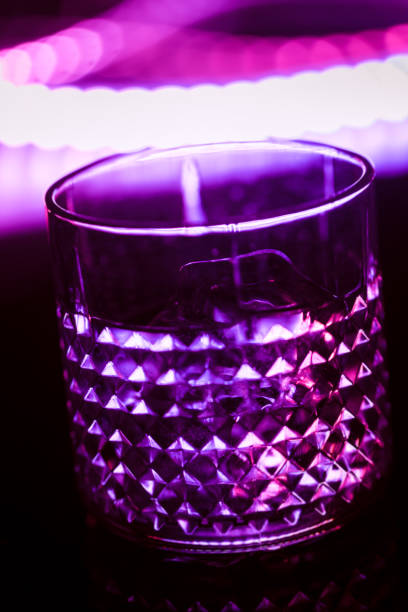 istock bar colored lights with glasses of alcohol 1023431680
