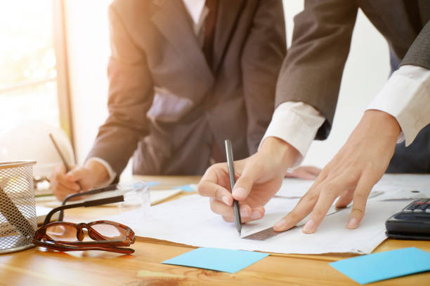 istock Two man Architecture shot Engineer discussing meeting for architectural project with partner businessman Close up shot. 1023432606