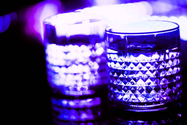bar colored lights with glasses of alcohol