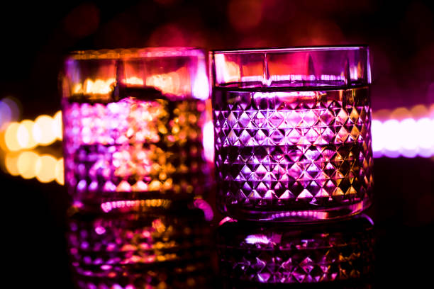 istock bar colored lights with glasses of alcohol 1023433062
