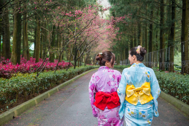 istock female tourists taking a short walk in the forest 1023453674