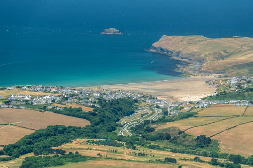 Aerial Views over Polzeath Beach, Hayle Bay, North Cornwall on a sunny June day.