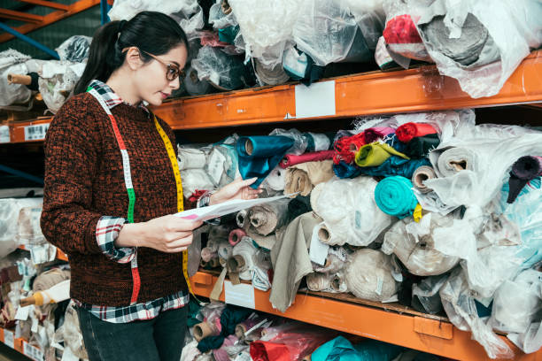 istock woman manager searching the appropriate texture 1023462426
