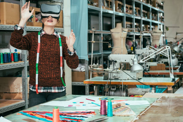 istock woman wearing wearing VR headset 1023463296