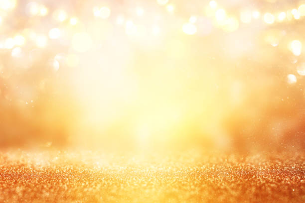 istock glitter vintage lights background. silver and gold. de-focused. 1023467764