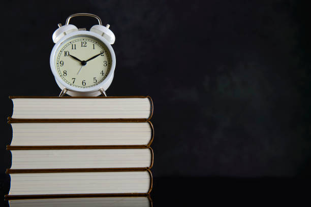istock Books and alarm clock 1023471712