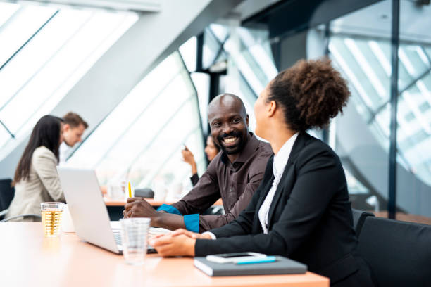 istock Two business people discussing new business strategy 1023481310
