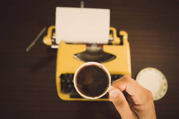 istock Cup of coffee before you start writing. 1023486684
