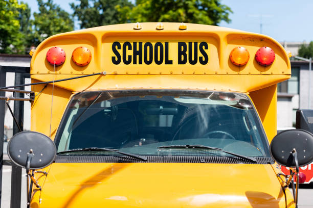 istock front view of school bus with inscription over front glass 1023496294