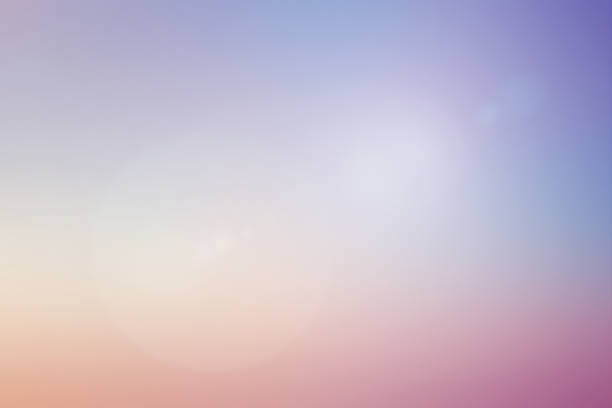 istock blurred beautiful natural pastel background lens ray flare flash light. 1023496822