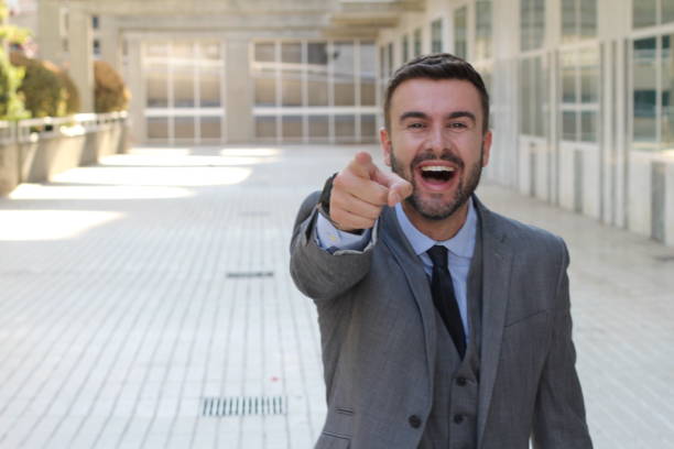 istock Man laughing to a funny joke 1023505036