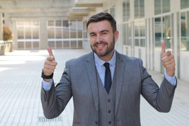 istock Confident businessman pointing at camera 1023505174