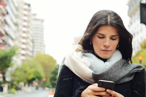istock Young women sending message with smartphone. 1023514100