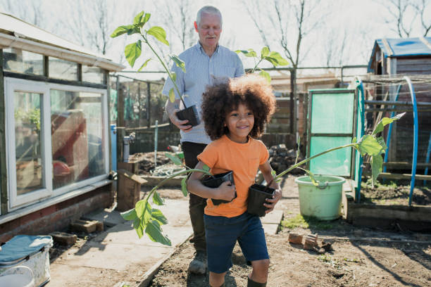 istock Helping Grandad in his Allotment 1023514384
