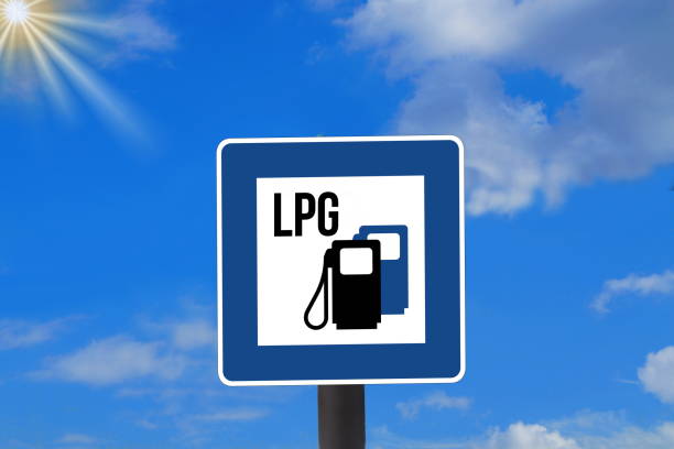 A traffic sign and reference to a gas station with LPG gas A traffic sign and reference to a filling station with LPG gas liquefied petroleum gas photos stock pictures, royalty-free photos & images