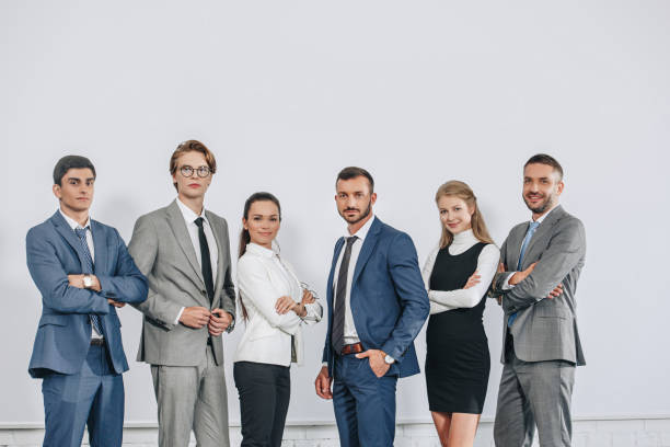 istock businesspeople posing near board after training in hub 1023518924