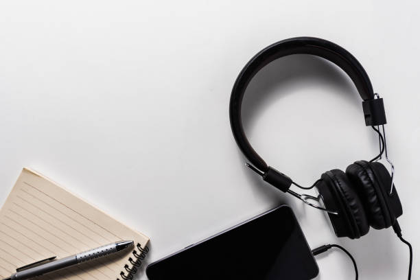 istock headphone and mobile phone, music concept 1023521076
