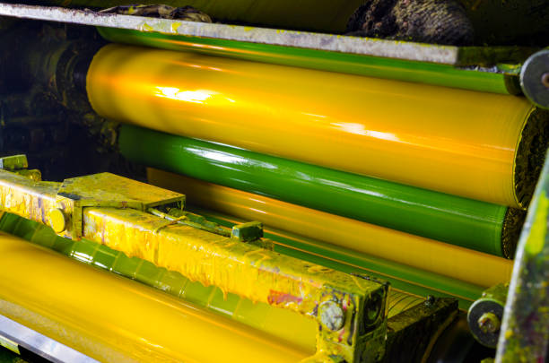 istock printing machine yellor cylinders and printing ink 1023523242