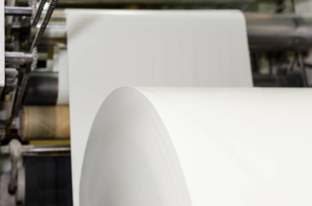 istock Printing press machine with blank rolls of newsprint 1023523284