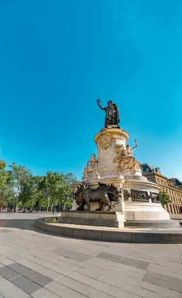 Photo of The monument to the Republic with the symbolic statue of Marianna, in Place de la Republique, vertical