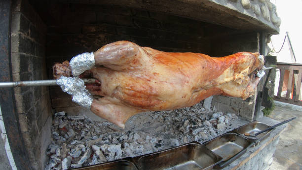 istock Lamb meat grill rotating on spit 1023527304